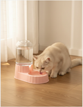 Gravity pet water dispenser with upper reservoir refilling the bowl below